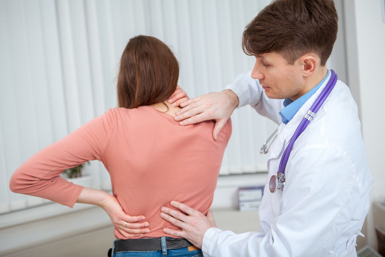 Scoliosis and kyphosis treatment in Indore showing spine examination by specialist